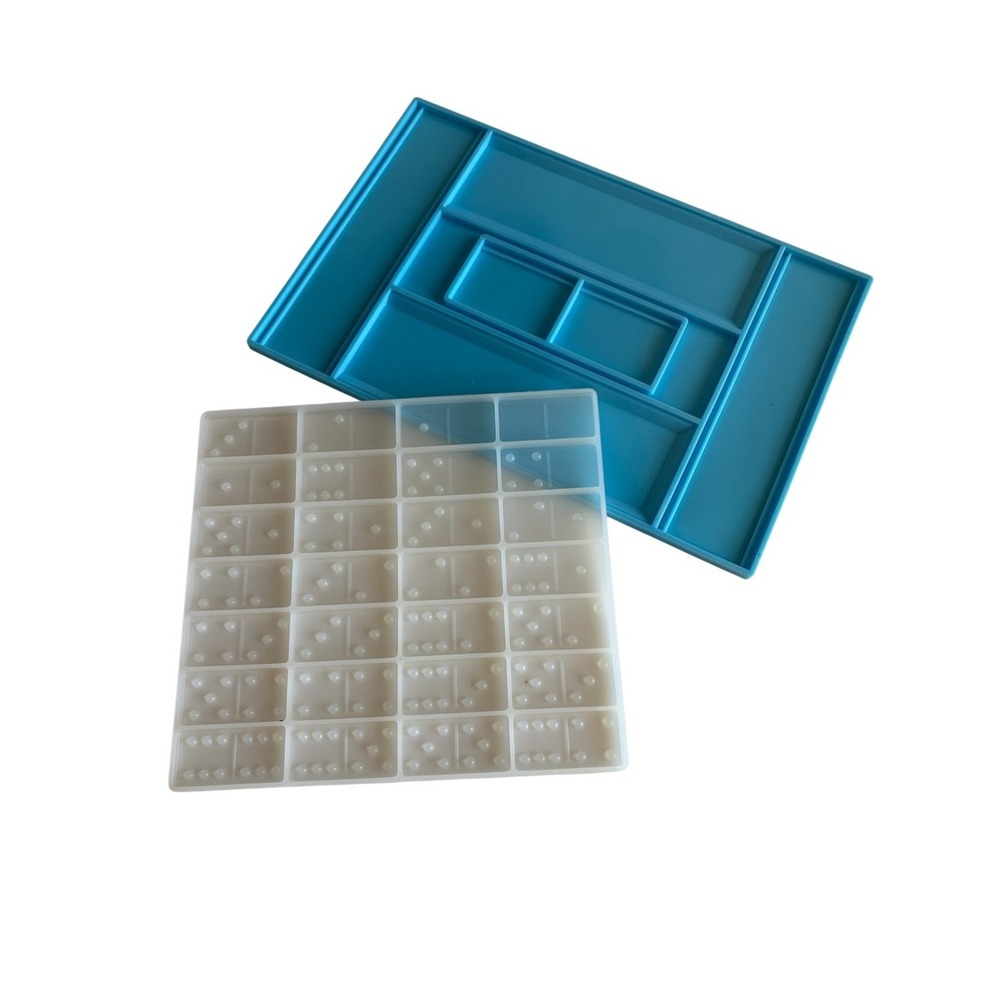 Resin molds for dominoes and domino carrying case